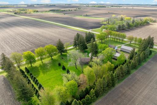 Appreciate this meticulous 5 acre property with spacious one level home & fantastic shop & storage!