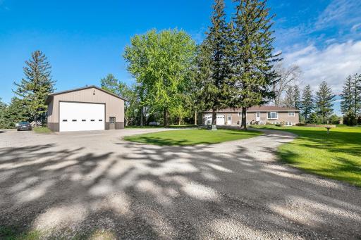 Beautiful home & yard in addition to a fantastic in-floor heated shop!