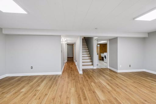 Basement looking towards laundry and hallway