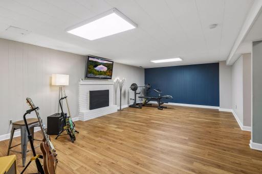 Spacious basement with fireplace