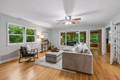 Family room surrounded by windows