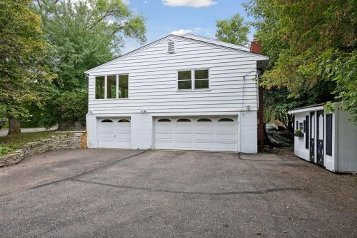Huge 3 car garage plus storage shed