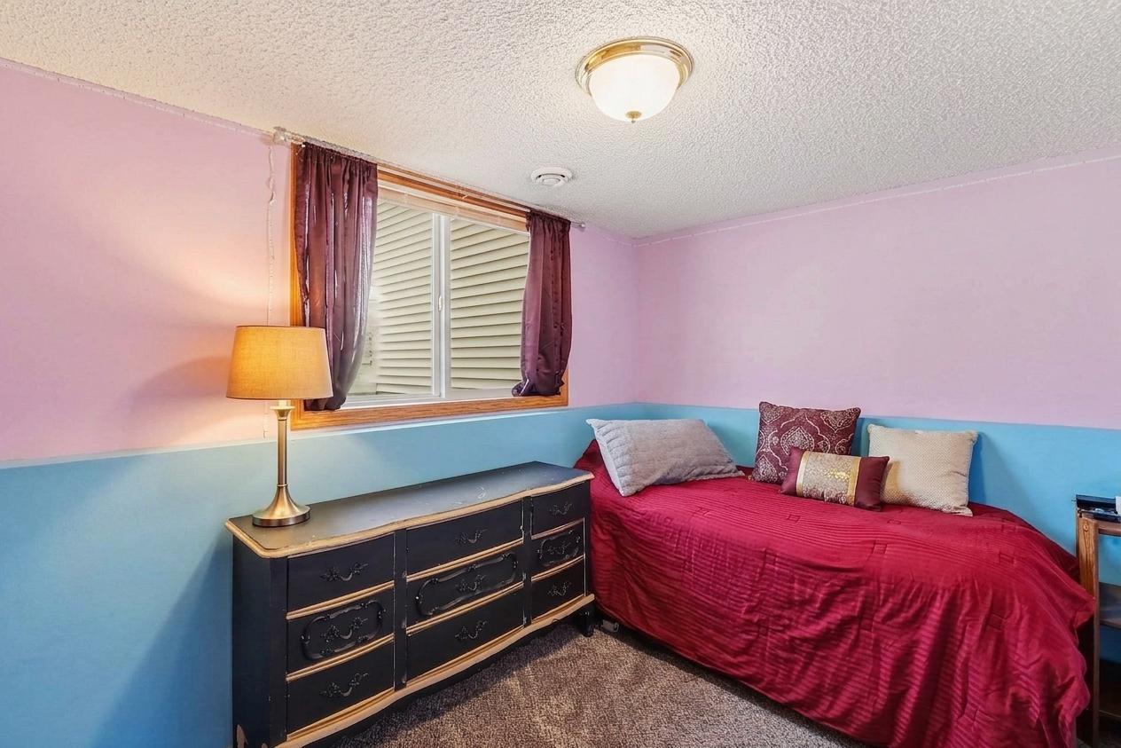 One of two lower-level bedrooms.