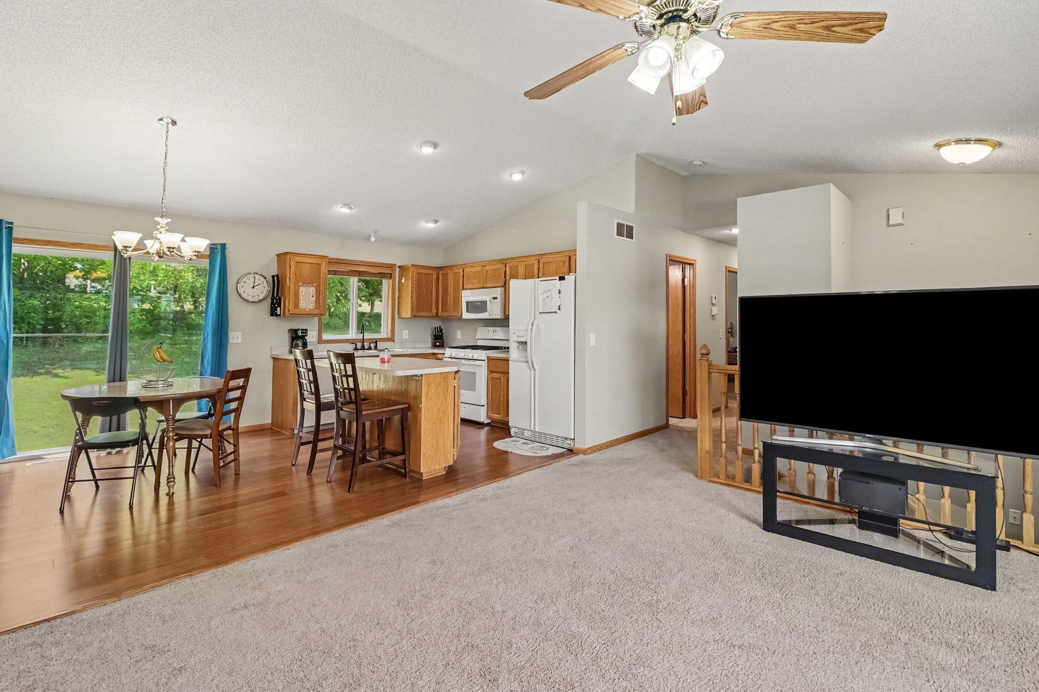 Alternate view of the main-level living area, highlighting the open-concept layout.