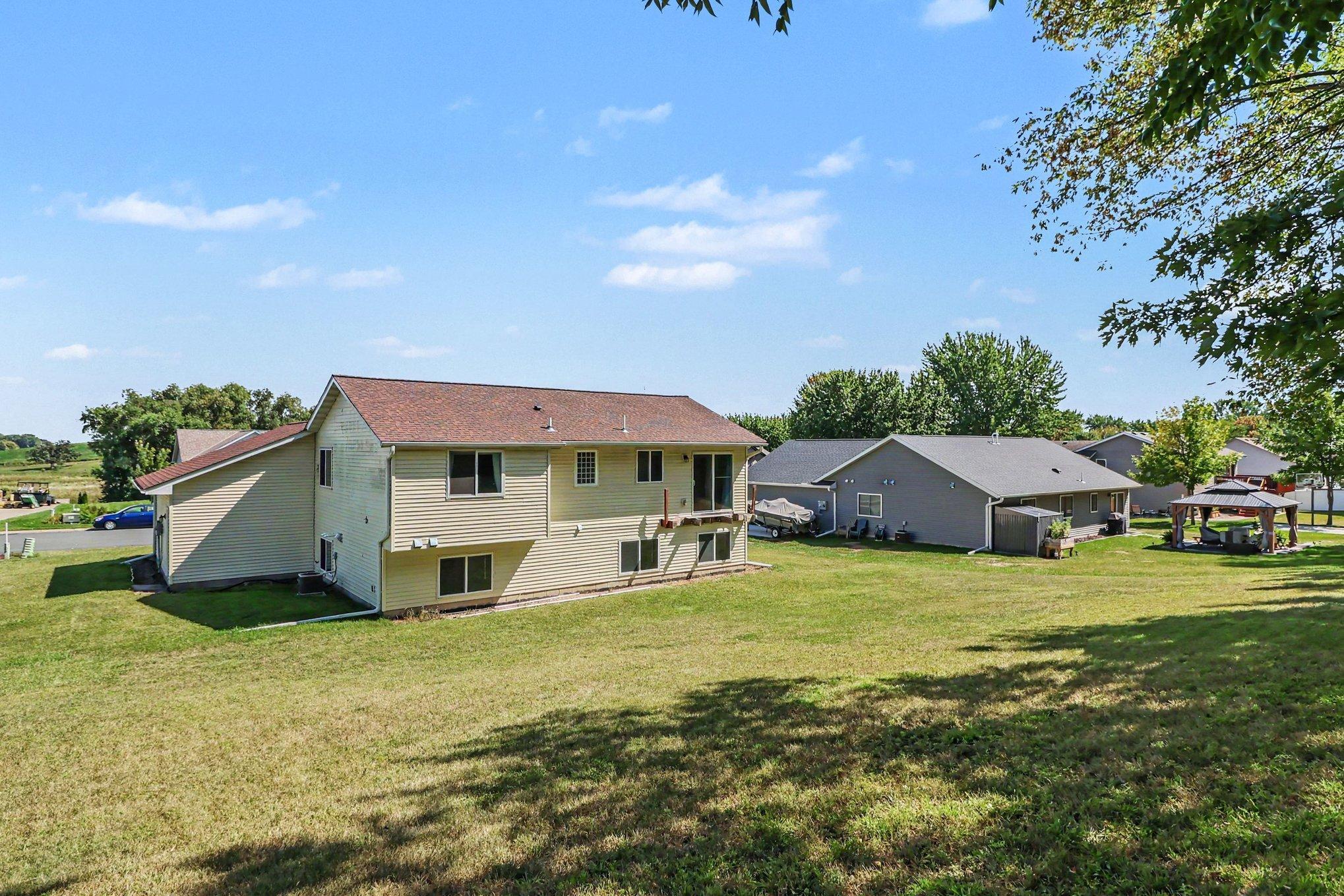 Additional backyard perspective with outdoor space behind the Montgomery home.