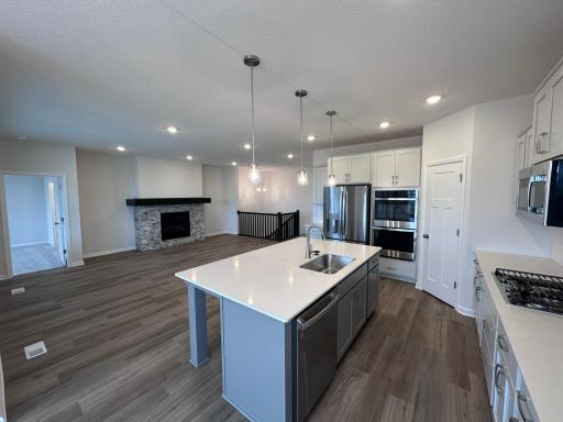 Lifestyle kitchen and stone gas fireplace!
