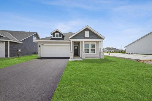 Welcome to the Berry! Driveway and sod virtually staged. Irrigation, sod, mulch, landscaping included. Photo of actual home.