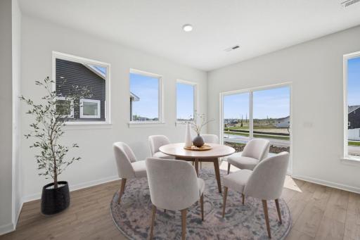Virtually staged dining room. Photo of actual home.