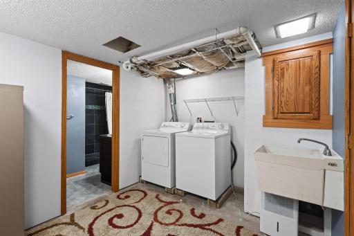 The laundry room is located on the lower level and provides more great space