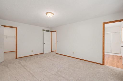 Primary bedroom with 3/4 bath, large walking closet.