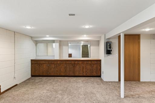 This area will be great during the Christmas gift wrapping season. Lots of counter and storage space.