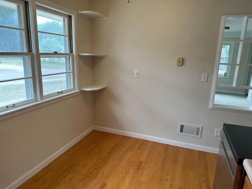 Nice corner eat in kitchen, with hardwood floors.