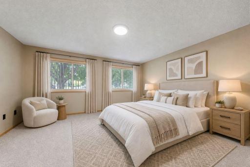 Maine level primary bedroom with walk-in closet.