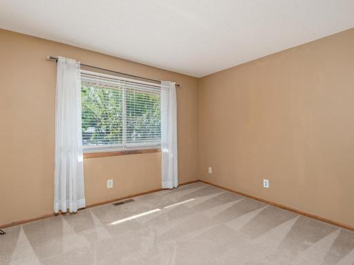 The second main floor bedroom could also be used as a home office or den.