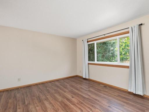 A great space, just off the kitchen & dining room, with sightlines to front & backyard. Perfectly convenient for everyday living or entertaining guests.