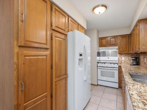 Ample storage, practical work space & a gas range!