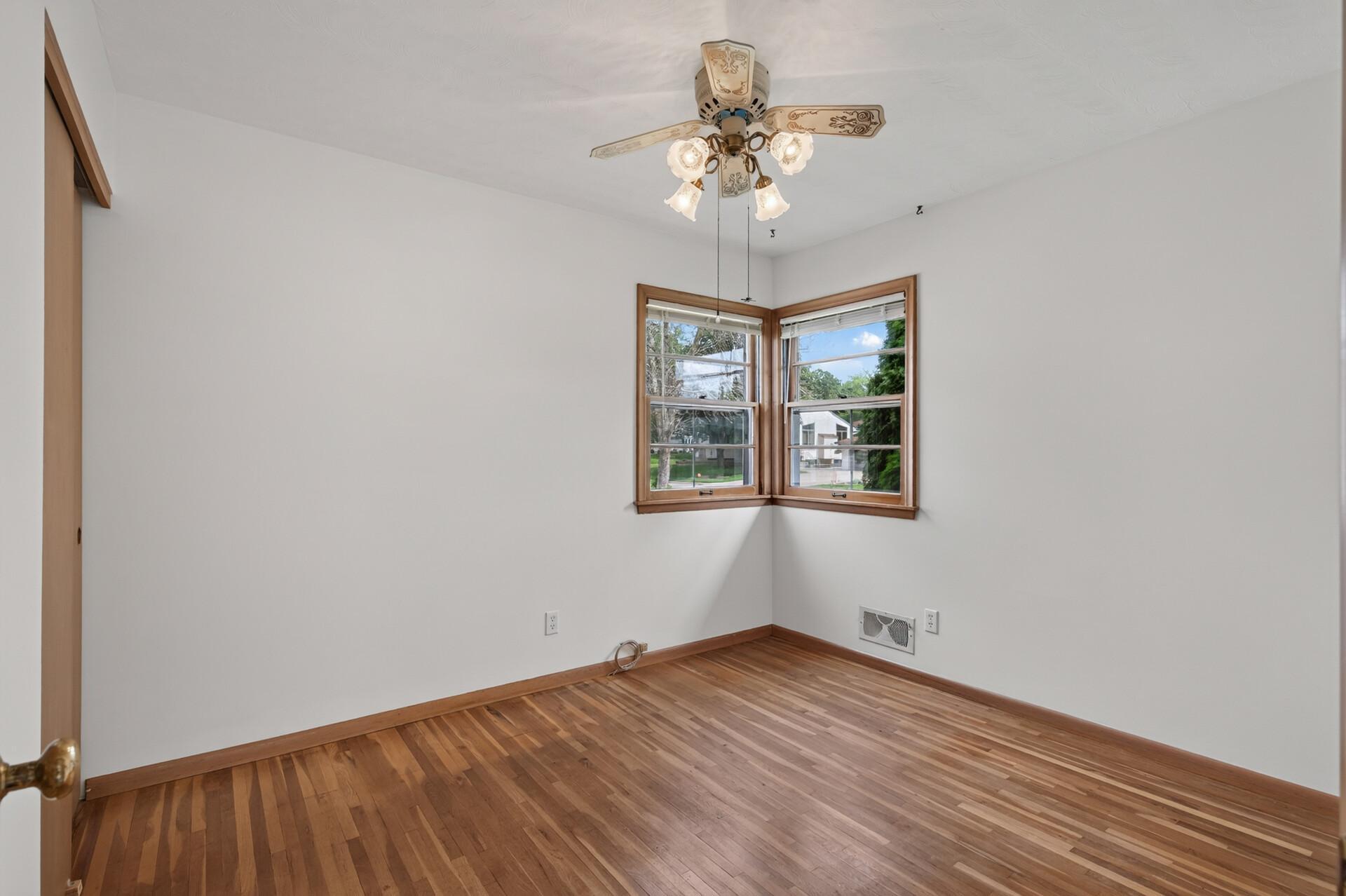 Front bedroom - hardwood floors revealed!