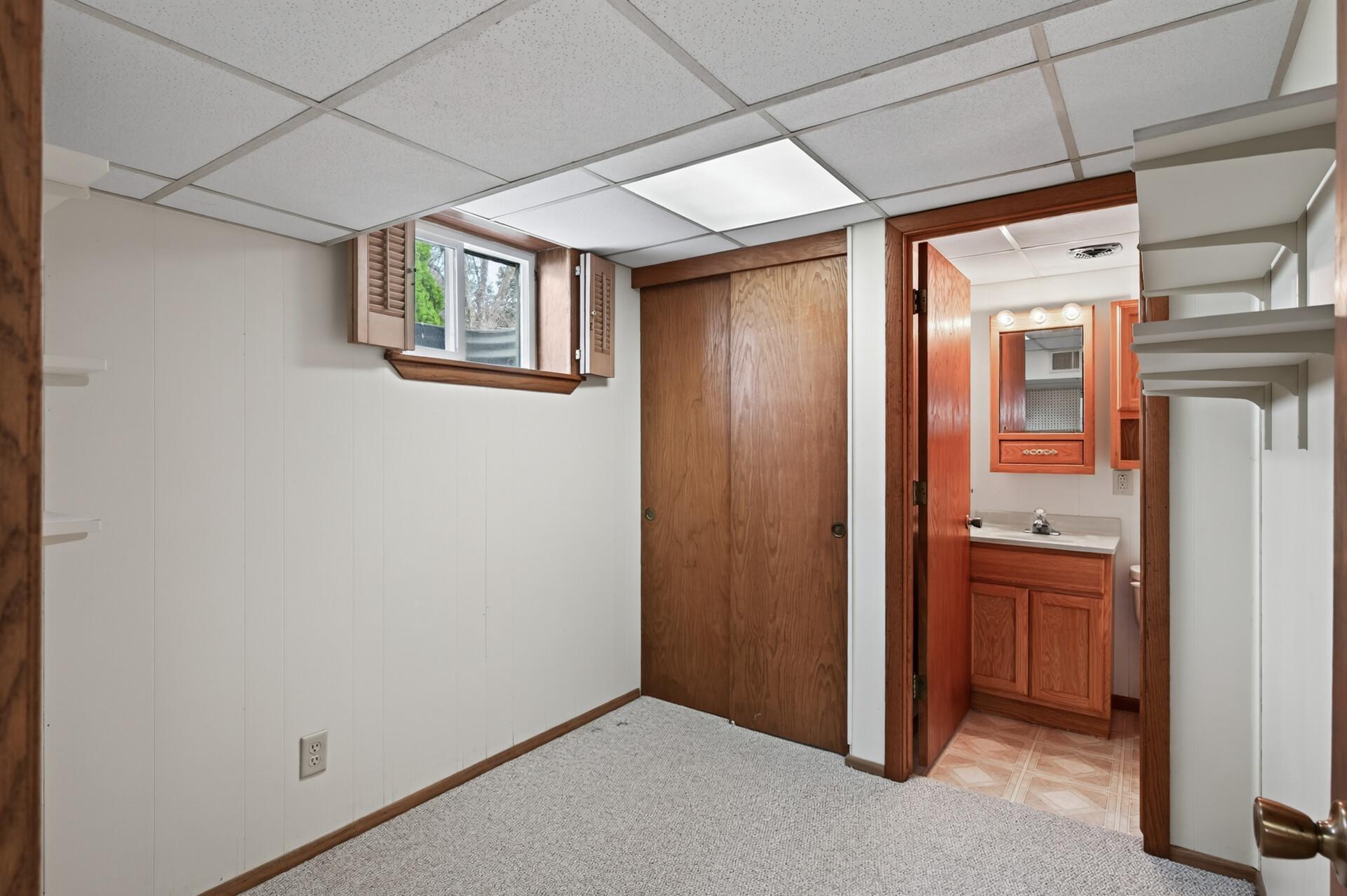 Lower room could be an office, den, exercise room..... Attached to a half bathroom.
