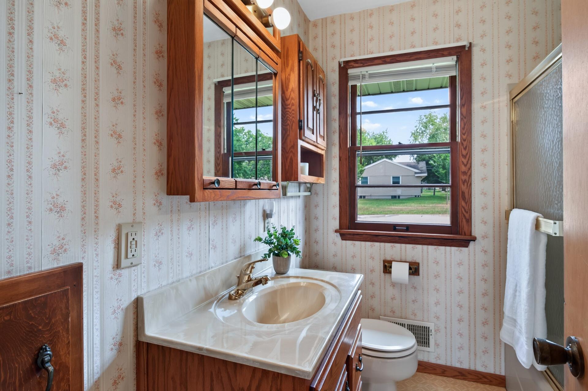 Main floor bathroom. Notice the clothes chute...