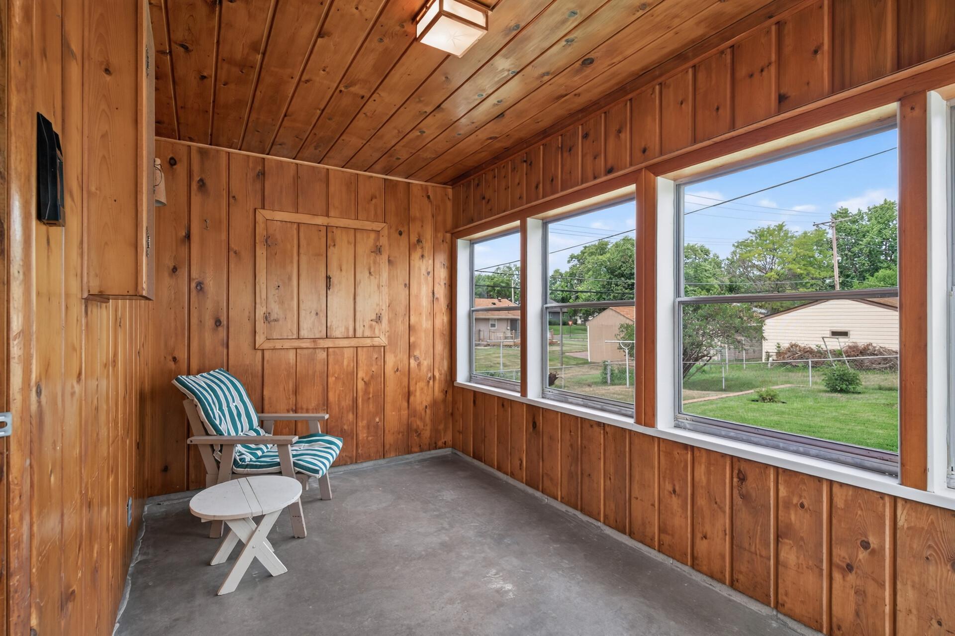 Your very own three season porch with cedar walls! Attached to the garage.