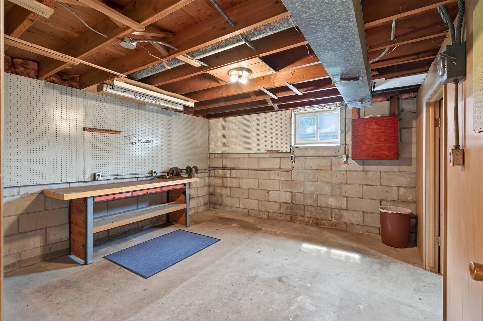 Your very own workshop with mounted storage for all the nails, screws, etc. Still labeled and full!