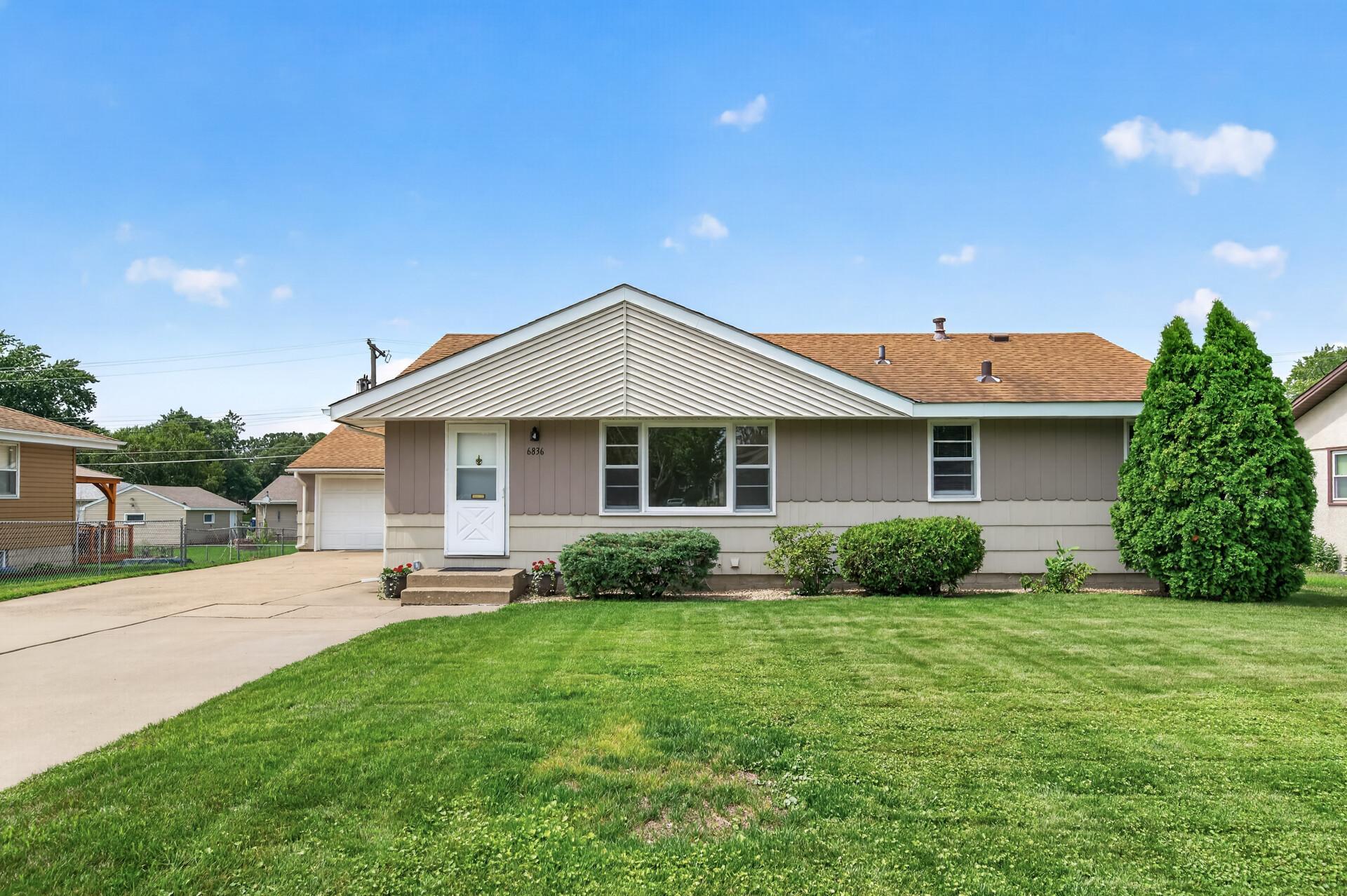 Welcome to 6836 Monroe St. The house is freshly painted.