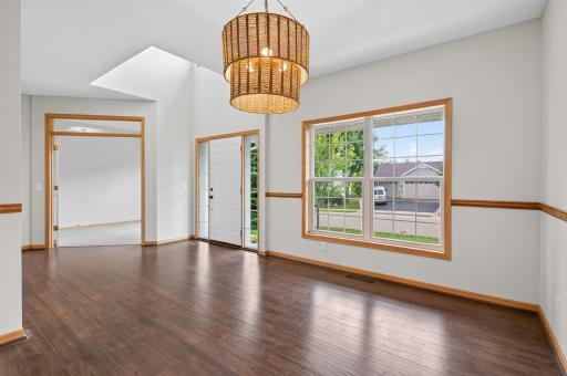 Open Foyer and formal dining room at entrance