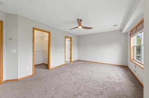Newer ceiling fan and light in main suite