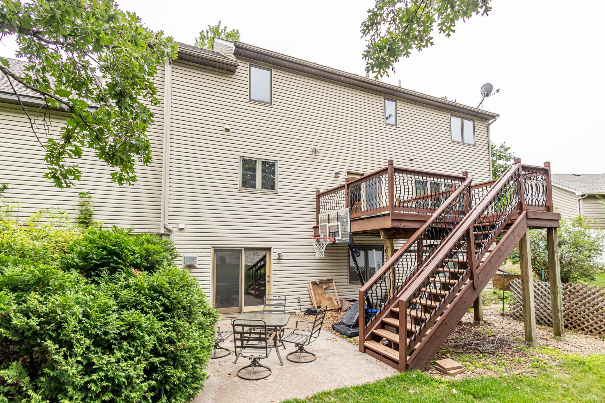 Concrete patio and maintenance free deck