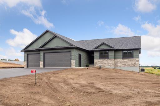 Photos are of a previously completed home with similar design and features. Actual selections, finishes, and materials may vary based on buyer choices and availability.