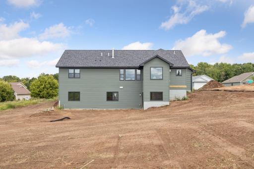 Photos are of a previously completed home with similar design and features. Actual selections, finishes, and materials may vary based on buyer choices and availability.