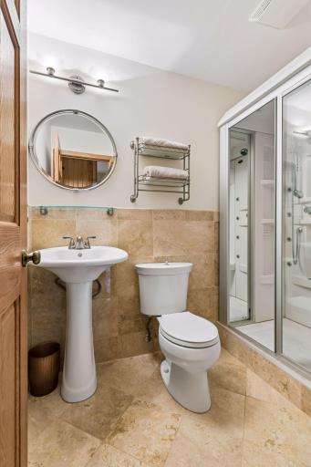 main level 3/4 bath with Steam Shower