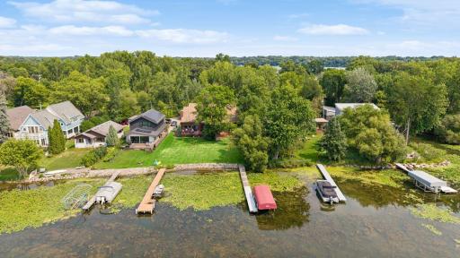 Welcome to 225 Peninsula Road with 38 feet of lakeshore on Medicine Lake.