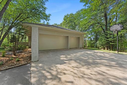 Oversized three car end-load garage with stairs down to lower level!