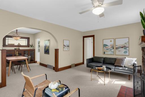 The large, arched doorway provides a wonderful, open flow between the living room and dining room