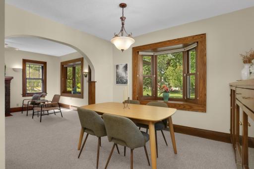 Enjoy the view out the bay windows overlooking the beautifully landscaped front yard and the Parkway