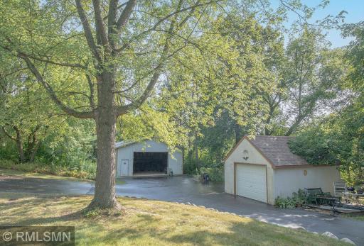 30x48 Pole Barn and detached 14x20 single car garage for outside projects and storage!