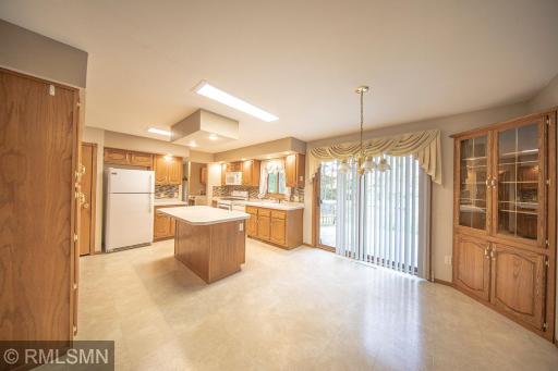 Spacious kitchen with more than ample counterspace and cabinetry.