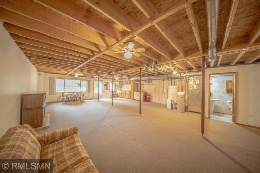 Walk out to the patio covered by a roll out awning for an afternoon break!.