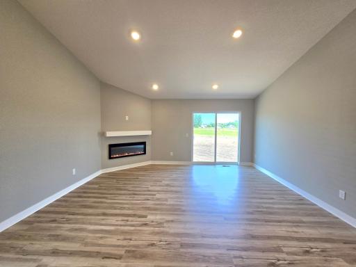 The Rushmore Main Floor Living Room at Highlands at Eagle View in Elko New Market. Photo is of similar home. Options and colors may vary. Ask Sales Agent for details.