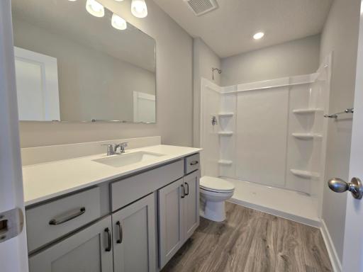 The Rushmore Primary Bathroom at Highlands at Eagle View in Elko New Market. Photo is of similar home. Options and colors may vary. Ask Sales Agent for details.