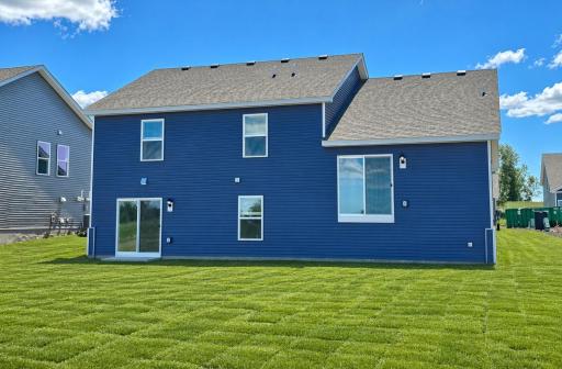 Walkout lower level! Photo is of actual home. Colors and options may vary. Ask Sales Agent for details. AI-generated landscaping for visualization. Actual yard condition may differ.