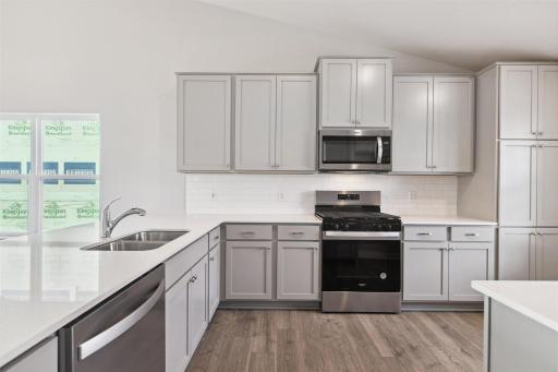 Plenty of cabinets for all of your cooking needs. Photo is of similar home. Colors and options may vary. Ask Sales Agent for details.