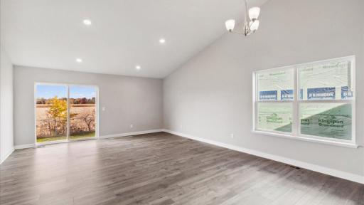 Flexible space to arrange furniture. Photo is of similar home. Colors and options may vary. Ask Sales Agent for details.