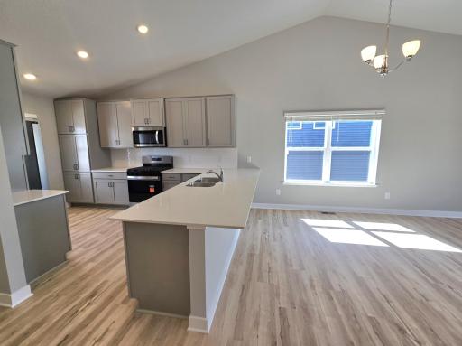 The Rushmore Main Floor at Highlands at Eagle View in Elko New Market. Photo is of similar home. Options and colors may vary. Ask Sales Agent for details.