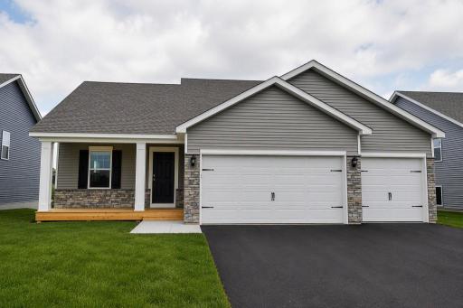 The Rushmore American Classic at Highlands at Eagle View in Elko New Market. Photo is of similar home. Options and colors may vary. Ask Sales Agent for details. AI-generated landscaping for visualization. Actual yard condition may differ.