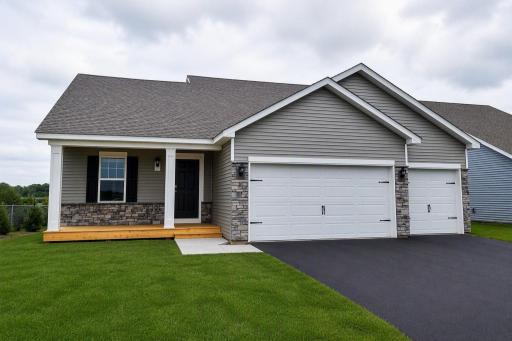 The Rushmore American Classic at Highlands at Eagle View in Elko New Market. Photo is of similar home. Options and colors may vary. Ask Sales Agent for details. AI-generated landscaping for visualization. Actual yard condition may differ.