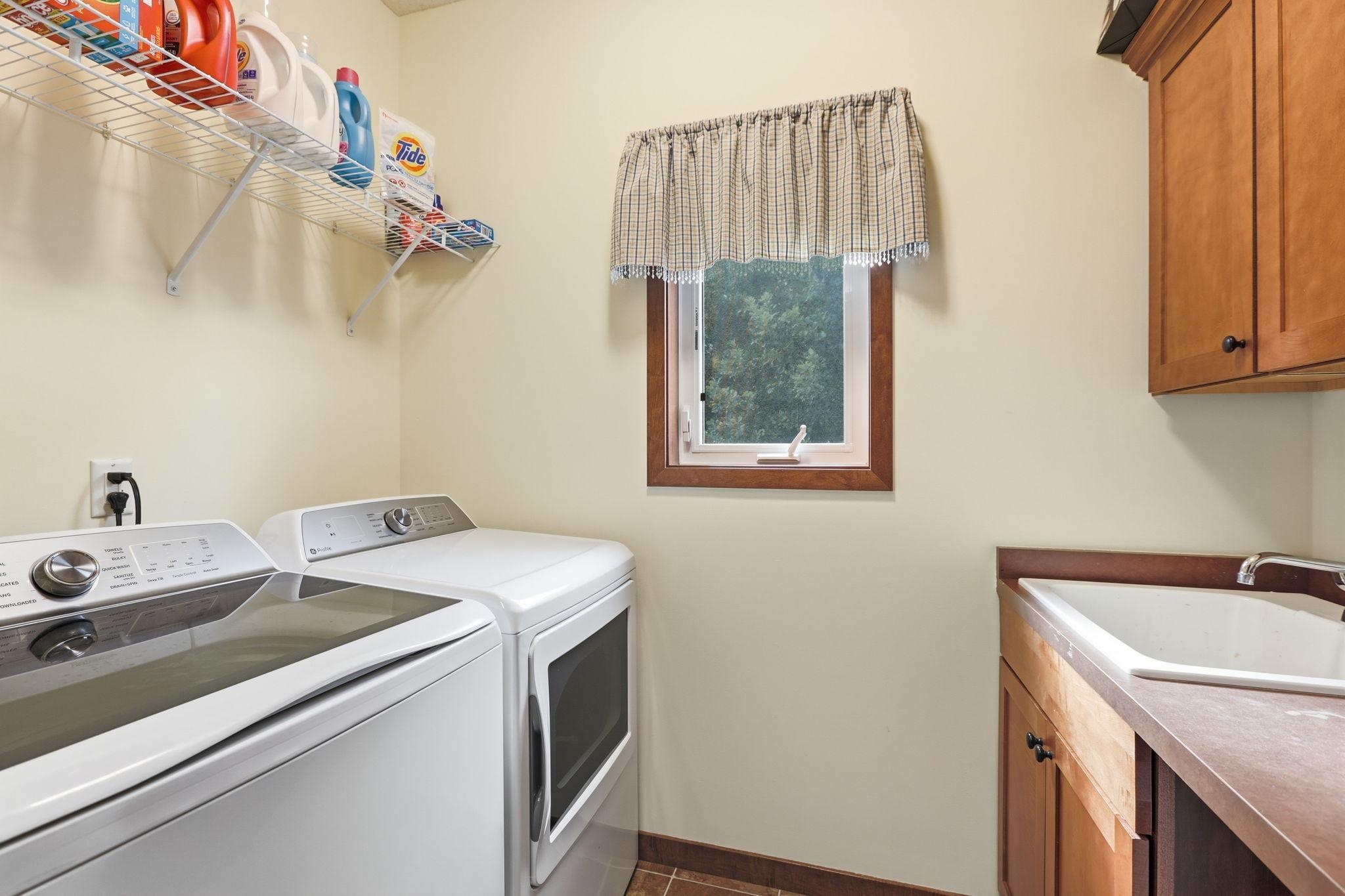 Drop your laundry off in the convenient main level laundry room. No dirty clothes upstairs!