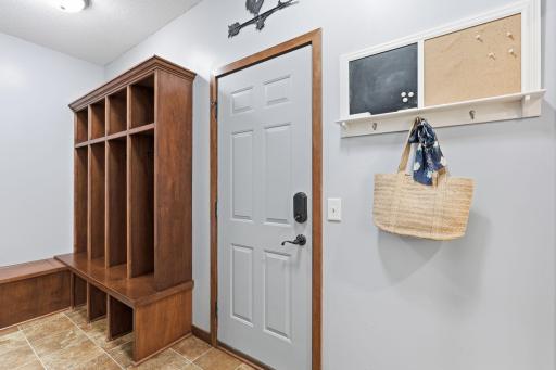 Built-in mudroom lockers make the drop zone very functional and the area even has a storage bench!