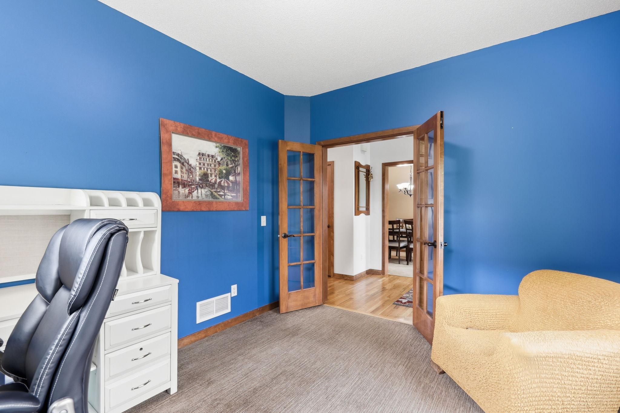 The main-level office opens into the front entry. It could be used as a main-level bedroom as well.